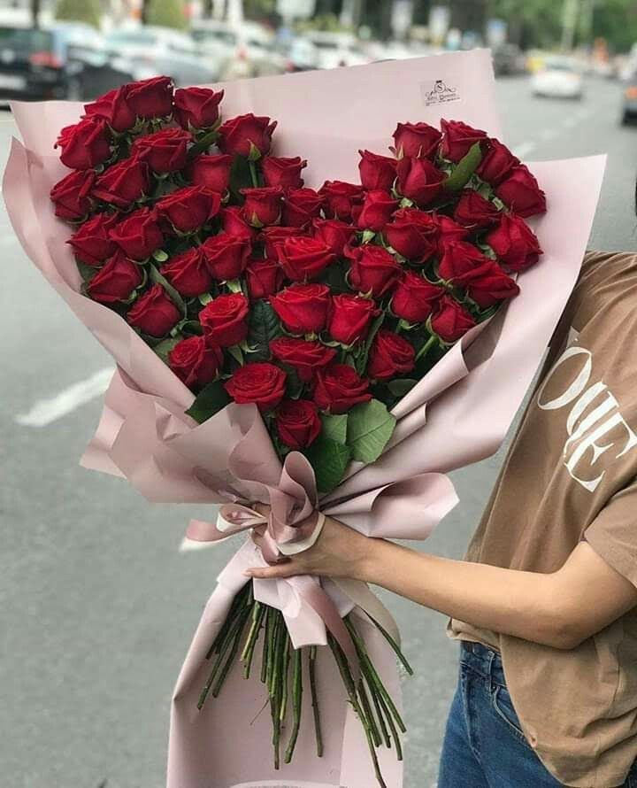 heart-shaped bouquet of red roses