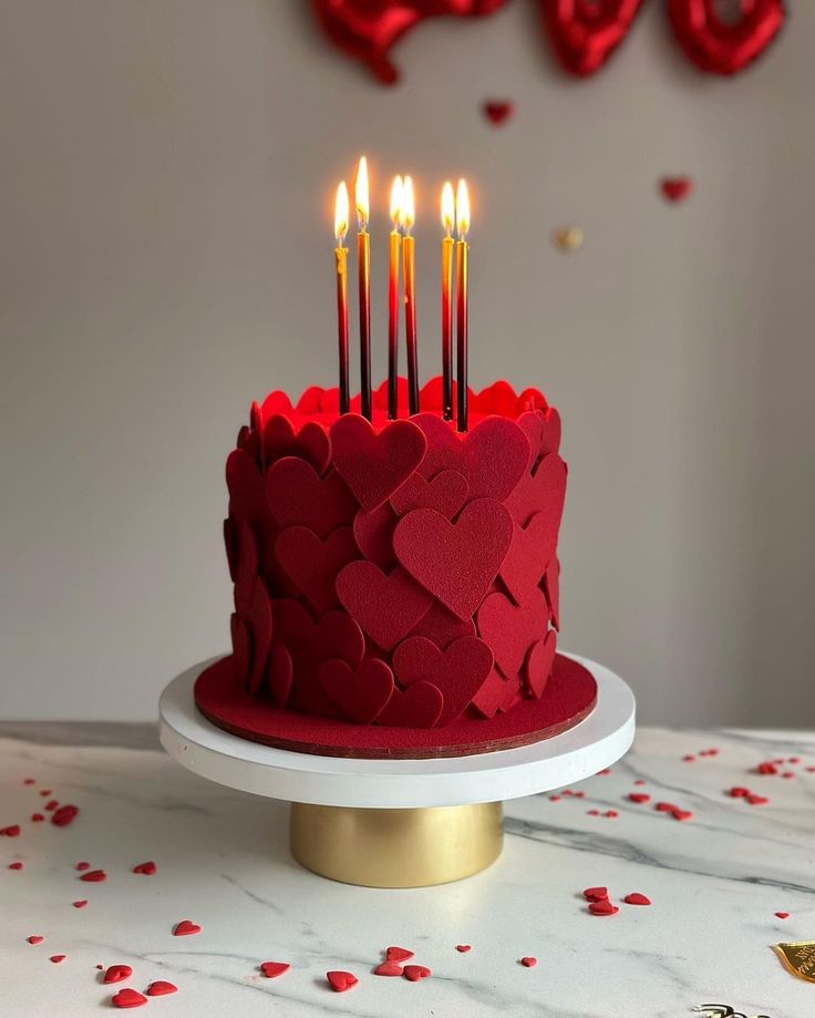 Elegant red cake decorated with heart-shaped